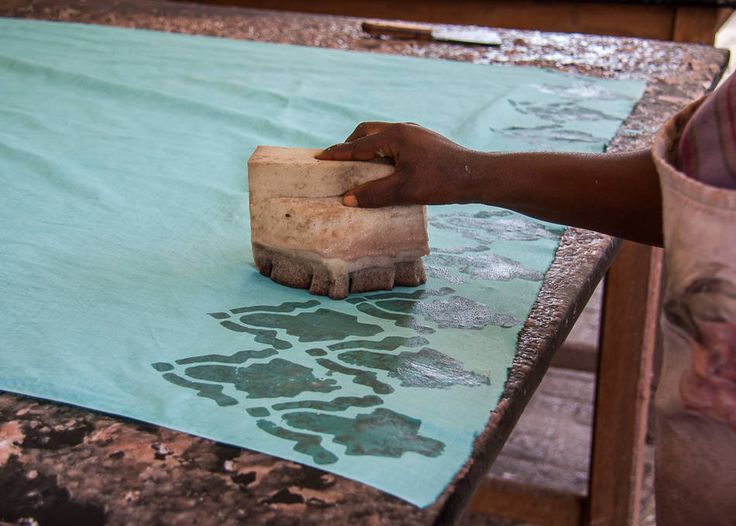 A Woman Using Making African Prints Using Batik